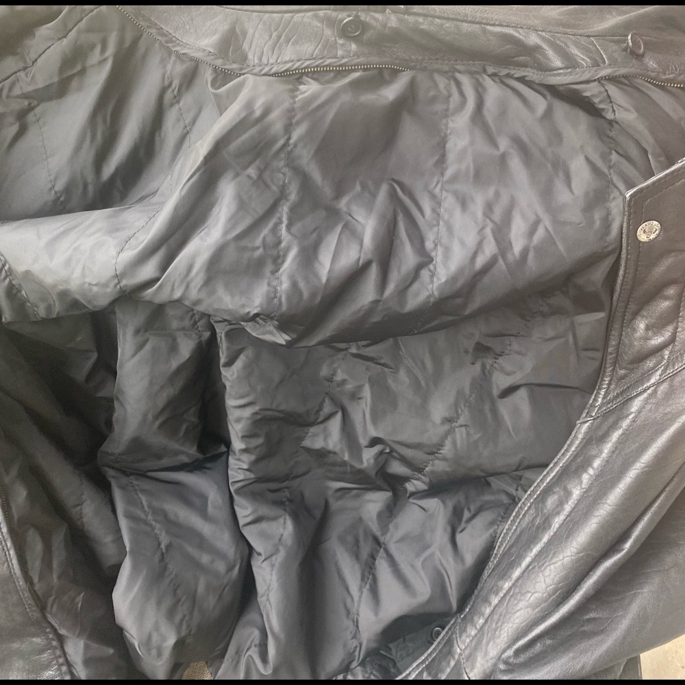 Leather jacket. 2xl . Very well kept with a belt along.
